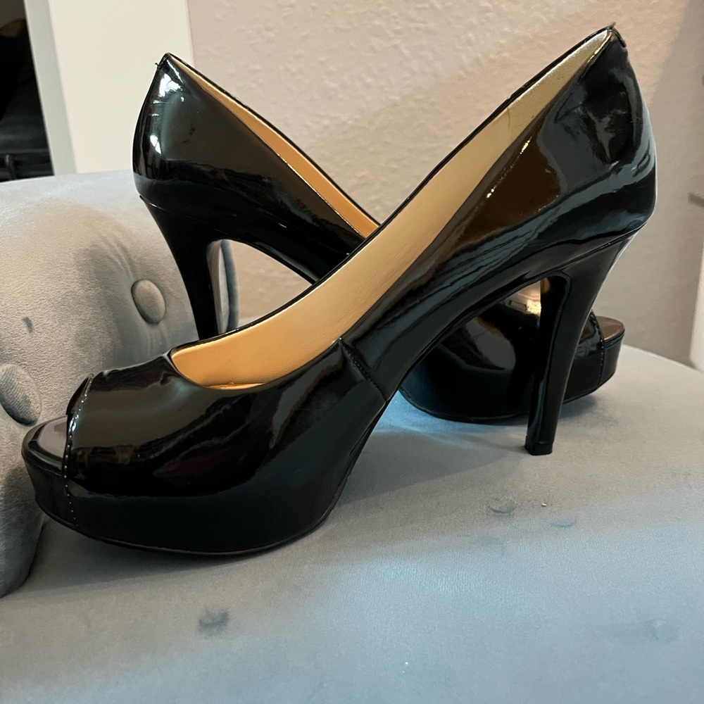 Nine West black peep toe pumps